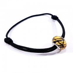 bracelet cordon noir avec nœuds coulissants et perle en verre jaune et noir