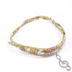 Bracelet en tissu liberty jaune vert avec pendentif clef de sol en argent massif