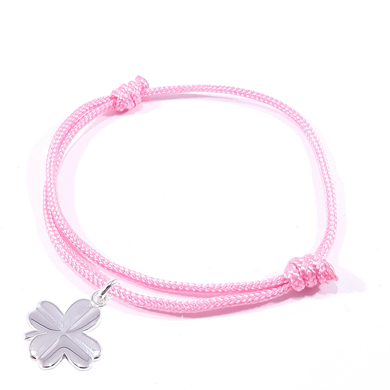 Bracelet porte bonheur en cordon tressé rose bonbon et pendentif trèfle en argent massif