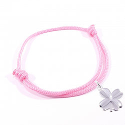 Bracelet porte bonheur en cordon tressé rose bonbon et pendentif trèfle