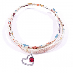 bracelet tissu liberty motifs multicolores avec pendentif coccinelle posée sur cœur