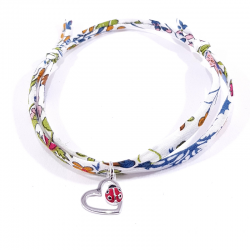 bracelet tissu liberty fleur de grenade avec pendentif coccinelle posée sur cœur
