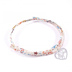 Bracelet en tissu liberty motifs étoilés et pendentif cœur ajouré avec inscription "Je t'aime".