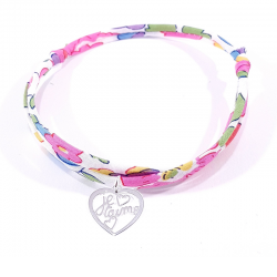 Bracelet en tissu liberty motifs fleuris roses et pendentif cœur ajouré  avec inscription "Je t'aime".