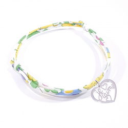 Bracelet en tissu liberty motifs fleuris jaune mimosa et pendentif cœur ajouré en argent massif avec inscription "Je t'aime".