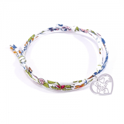 Bracelet en tissu liberty motif fleurs de grenade et pendentif cœur ajouré en argent massif avec inscription "Je t'aime".