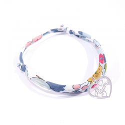 Bracelet en tissu liberty motif fleurs et pendentif cœur ajouré en argent massif avec inscription "Je t'aime".