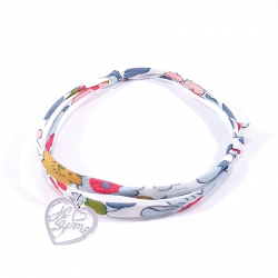 Bracelet en tissu liberty motif fleurs et pendentif cœur ajouré avec inscription "Je t'aime".