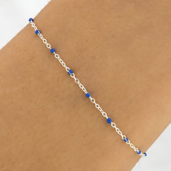 bracelet argent et petites boules en résine bleue